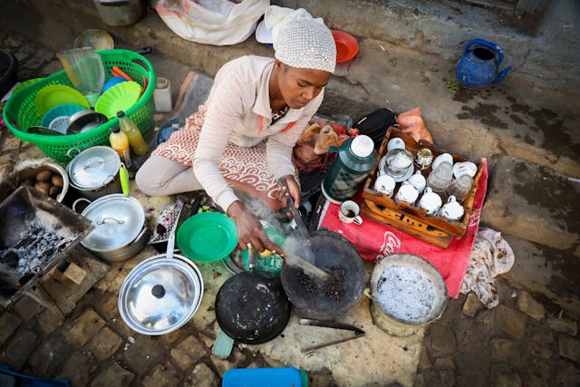 Addis Ababa Ethiopia Woman Roasting Coffee