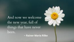 Image: Daisy in foreground and a blurry background of mountain and lake. Quote “And now we welcome the new year, full of things that have never been.” – Rainer Maria Rilke