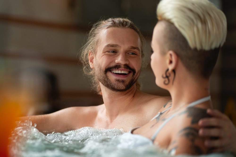 couple-relaxing-hot-tub